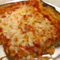 Sicilian Pizza Slice · [Sicilian pizza slice]