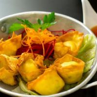 Crab Rangoon · Fried wonton with kani and cream cheese served with sweet chili sauce.