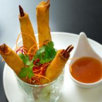 Fantastic Shrimp Rolls · Deep fried rolls stuffed with shrimp served with sweet and chili sauce.