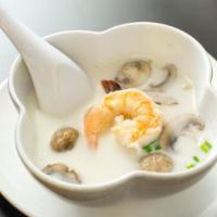 Tom Kha Soup · Choice of chicken or shrimp. Coconut based soup with mushrooms seasoned with aromatic galang...
