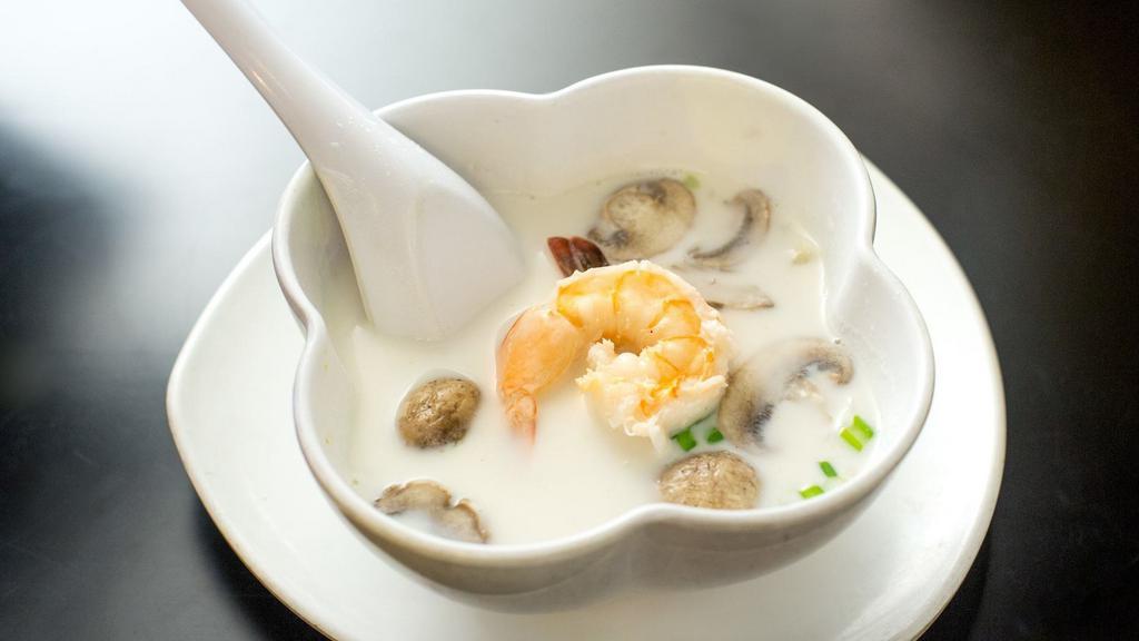 Tom Kha Soup · Choice of chicken or shrimp. Coconut based soup with mushrooms seasoned with aromatic galangal and lime juice.