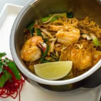 Pad Thai · Stir-fried rice noodle with egg, bean sprouts, bean curds, turnips, scallions, and crushed p...