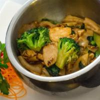 Pad See Eiw · Broad flat rice noodle stir fried with egg, American and Chinese broccoli in a sweet soy sau...