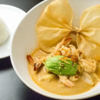 Shrimp Massaman Avocado · Hot. Mild spicy. Shrimp in massaman curry sauce with potatoes, onions, dried shallots, and p...