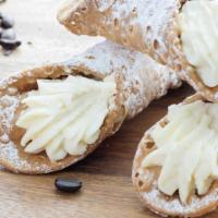 Cannoli · Sweet cream filled into a waferlike pastry.