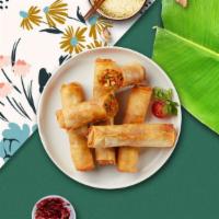 Reason For Every Spring Roll · Vegetables wrapped in rice wrapper and fried until golden crisp. Served with plum sauce (3 p...
