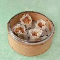 Shanghai Shumai 上海烧卖 (4) · Traditional dumpling with sticky rice, minced ham and minced shiitake mushroom.