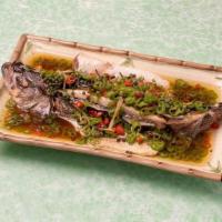 Steamed Whole Fish With Asian Chili 鲜椒全鱼 · Sea bass, cayenne peppers, tabasco peppers, green peppercorn