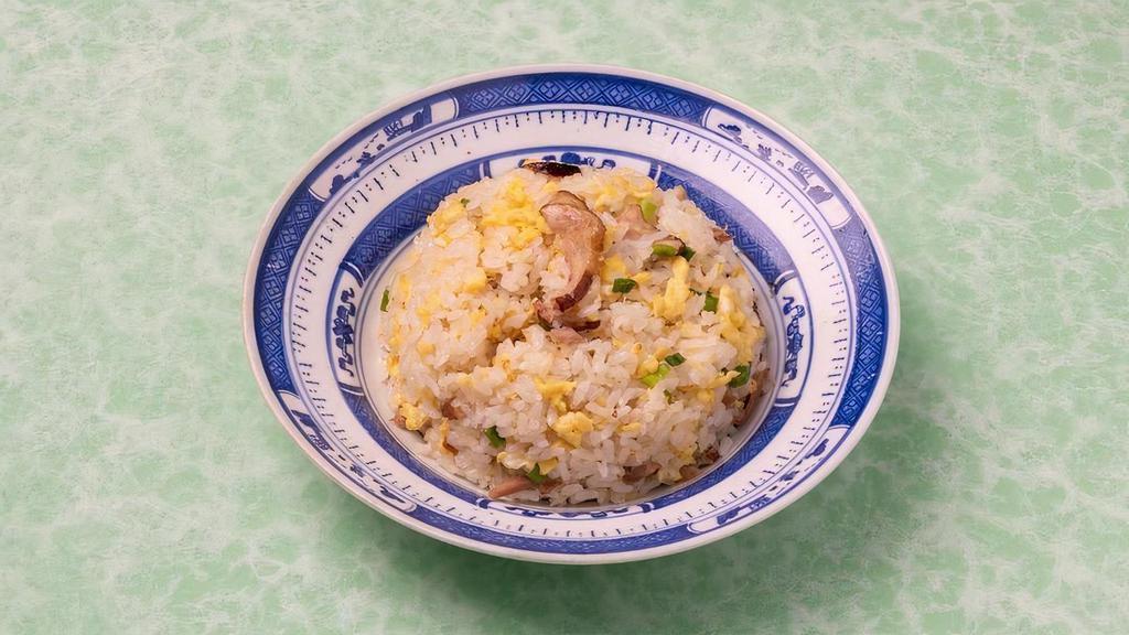 Fried Rice With Shredded Duck 樟茶鸭丝炒饭 · Tea smoked duck, egg, onion, scallion