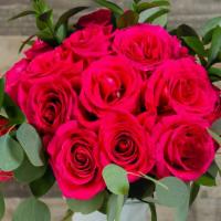 The Hudson Hot Pink Roses · A dozen of beautiful Hot pink roses, nicely arranged  with eucalyptus and Italian ruscus. Gi...