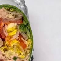 Ruby Chunky Tuna Salad Wrap · Served with romaine lettuce and tomatoes.