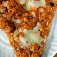Chicken Buffalo Pizza (8 Slices) · Breaded chicken, green peppers and Tabasco sauce mixed with mozzarella cheese and spicy sauce.