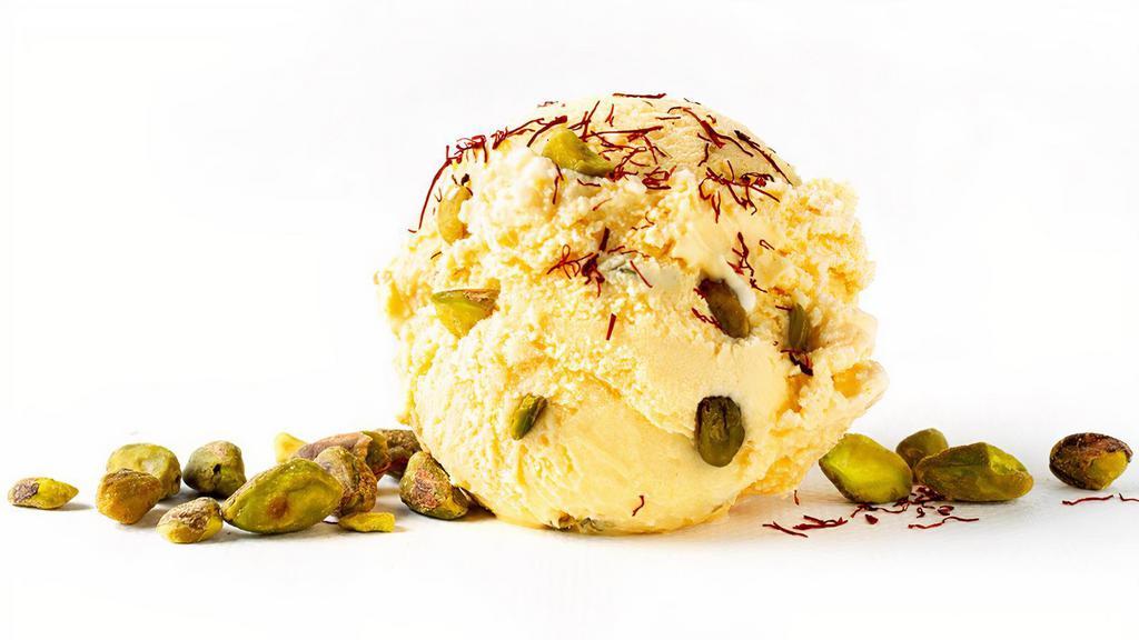 Saffron Pistachio · To create this fragrant, exotic, and lusciously tasty ice cream, we combine a delicate Spanish saffron flavor with chopped California pistachios.
 A favorite ice cream flavor in the East, we decided to pay tribute with our own version that makes use of the honey-like flavor and aroma of saffron, which boasts of a subtle earthiness, grassiness, and sweetness. We make sure to soak the saffron threads for two hours to extract the flavor before churning it with dairy. Once the ice cream is ready, we combine it with roasted and chopped California pistachios for a slightly chewy texture that results in a perfectly sweet gourmet ice cream.