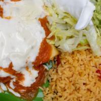 Chimichangas Vegetarianas · Two steamed vegetable and refried beans chimichangas topped with cheese dip and ranchero sau...