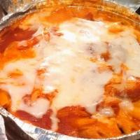 Baked Ziti · Made with whole milk ricotta cheese. sauteed with tomato sauce and topped with parmigiana.
