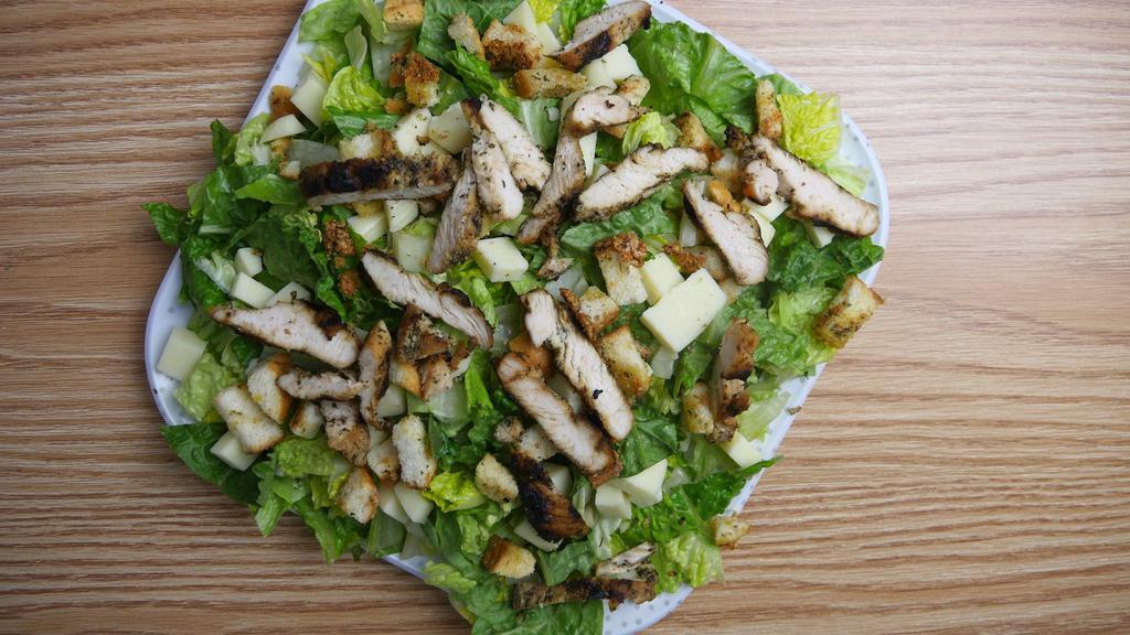 Grilled Chicken Caesar Salad · Grilled chicken, romaine lettuce and croutons. Topped with pecorino Romano and provolone cheese.