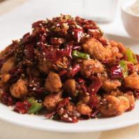 Dry Pepper Style · Spicy. Recommended.  Triple flash fried with long hots & dry chili peppers.