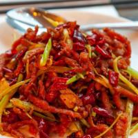 Dry Fry Style · 6. Spicy. Recommended. Triple flash fried with dry peppers, celery, hot peppers & Sichuan pe...