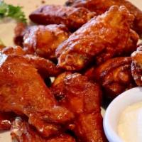Buffalo Wings   · 12 pieces . Served with blue cheese