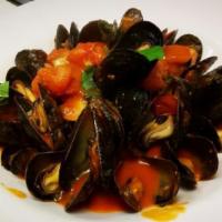 Zuppa Di Mussels · Fresh mussels, brothy marinara sauce, or white sauce.