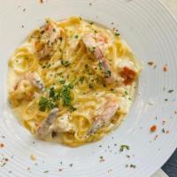 Fettuccine Alfredo With Shrimp  · creamy white sauce ...served with five jumbo shrimp over. Fettuccine pasta