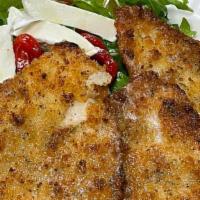 Pan Fried Veal Arugula  · Veal top round pan fried served with arugula salad .