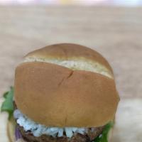Veggie Burger  · Veggie Patty, Lettuce, Onion, Tomato, Vegan Cheese