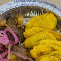 Bistec Encebollado · 8oz chopped steak and onions. choice of white rice, tostones or French fries