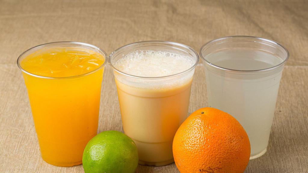 Freshly Squeezed Orange Juice · 16oz Orange Juice squeezed to order