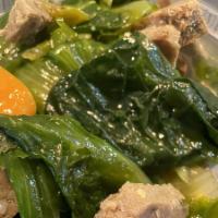 Chicken Escarole Soup · Our chicken soup with escarole and meatballs. Homemade and served with our famous garlic kno...