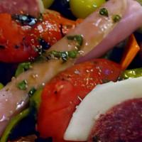Antipasto Salad · Large salad. A delicious assortment of Italian cold cuts (a roll up of salami, ham and provo...