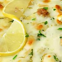 Chicken Francese Pizza · Cubes of chicken in our classic Francese sauce (lemon butter sauce) loaded with mozzarella c...
