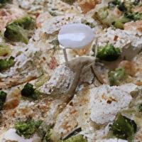 White With Broccoli Pizza · Our white pizza with the addition of sauteed broccoli. Served on sesame crust.