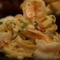 Fettuccine Alfredo · Served with homemade baked bread and dinner salad with our house balsamic vinaigrette dressi...