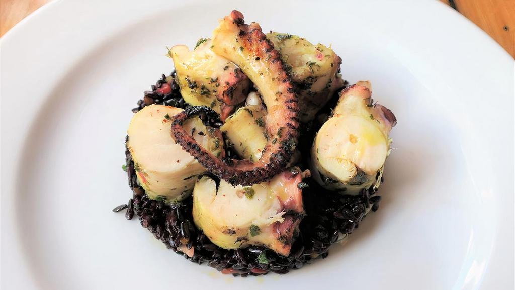 Grilled Octopus · israeli couscous, chickpeas, cerignola olives