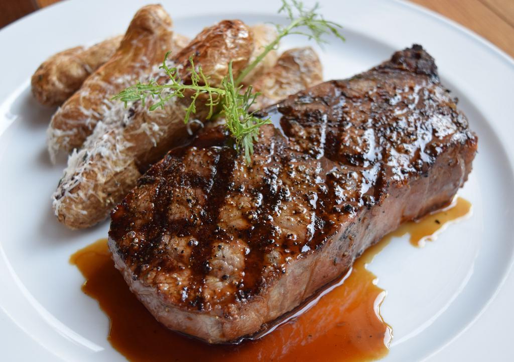 *Prime New York Strip Steak · yukon gold whipped potatoes