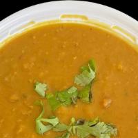 Yellow Daal · Yellow lentils cooked with onion, garlic.