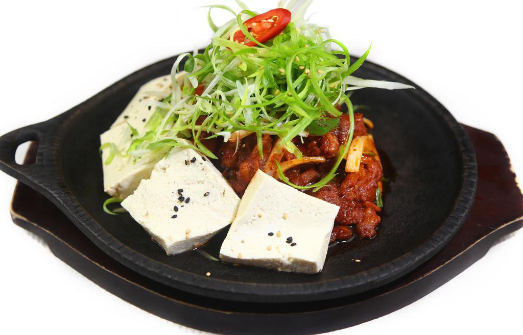 Spicy Pork Belly · Sweet and spicy marinated pork belly with tofu.