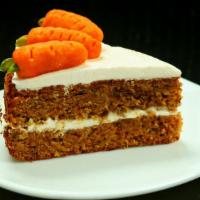 Carrot Cake · Perfectly spiced, moist carrot cake with a a thick, rich cream cheese frosting.