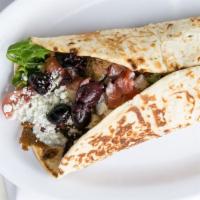 The Gyro Wrap · Housemade yeero meat, Greek salad, tzatziki.