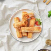 Rock And Spring Roll · Vegetables wrapped in broad rice noodle.
