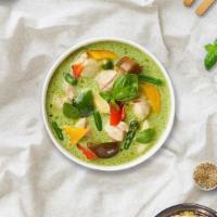Mean Green Curry · Slightly sweet and spicy curry with Thai eggplant, green bean, bell pepper, carrot, kaffir l...