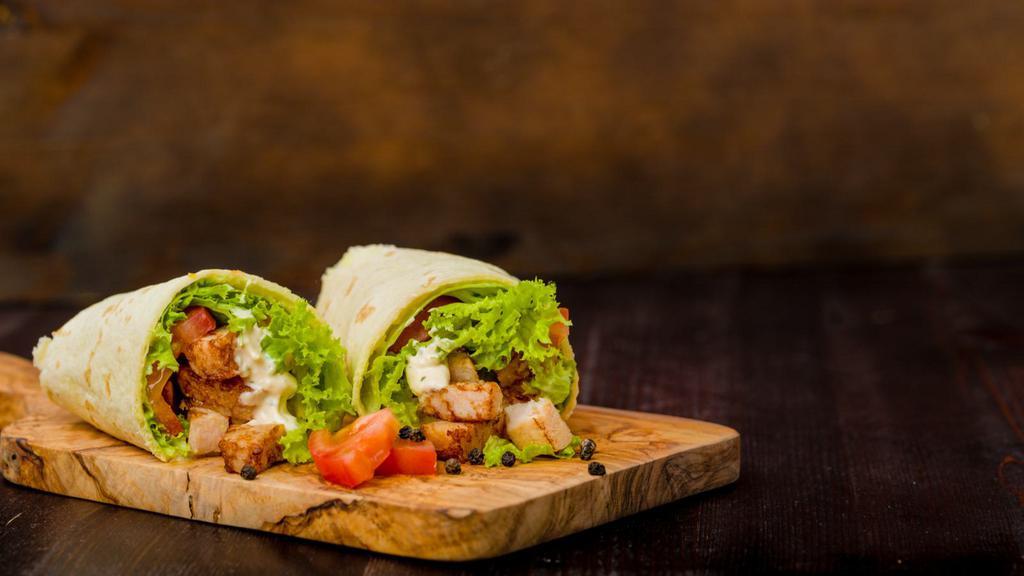 Jack Chicken Wrap · Delicious Wrap made with Breaded chicken, Jack cheese, hot peppers, lettuce, tomato and mayo.
