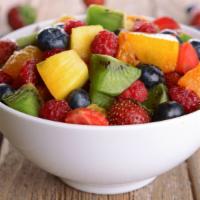 Fruit Salad · A delicious variety of mixed fruits, served in a cup.