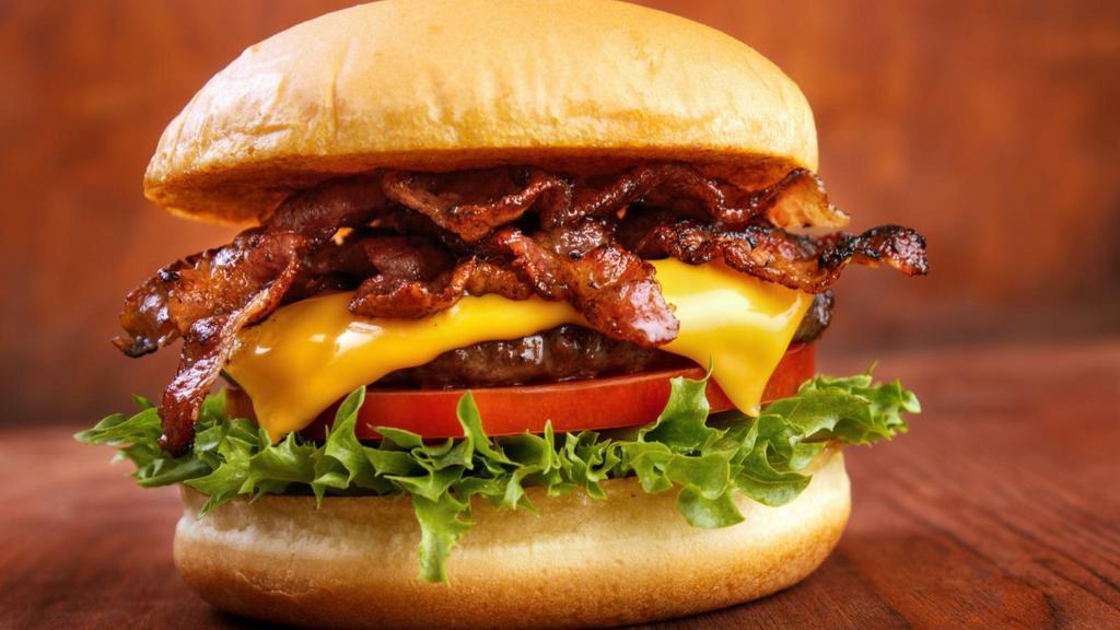 Bbq Bacon Cheeseburger · Savory Angus beef burger with American cheese, onions, pickles, lettuce, tomato and premium bacon. Drizzled with BBQ sauce.