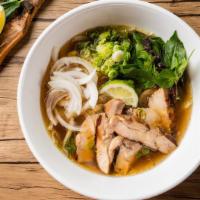 Chicken Pho Noodle Soup · Grilled chicken, with rice noodles, served with chicken broth soup, onions, scallions, and l...