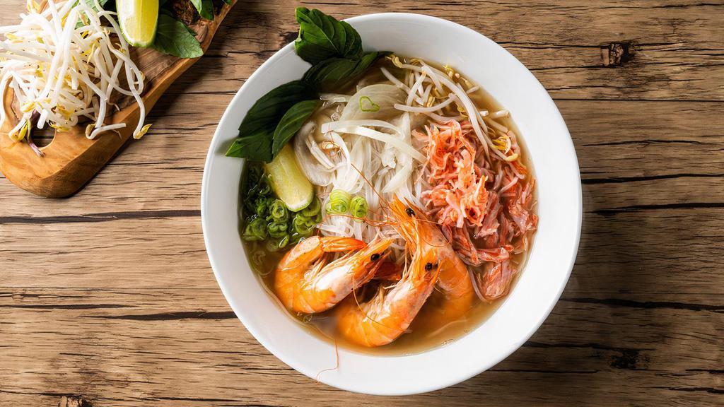 Shrimp Pho Noodle Soup · Jumbo shrimps with rice noodles, served with chicken broth soup, onions, scallions, and lemon, basil & bean sprouts on the side.