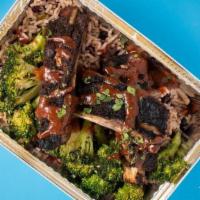 Warm Bowl Jerk Ribs + Broccoli · jerk ribs + durty rice + broccoli + sauce
