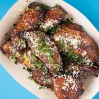 Sweet Plantains · cotija Cheese + herbs