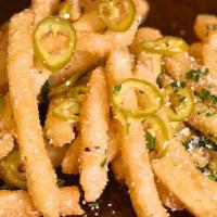Lolo'S Fries · cotija cheese / pickled jalapeños / garlic crema /herbs